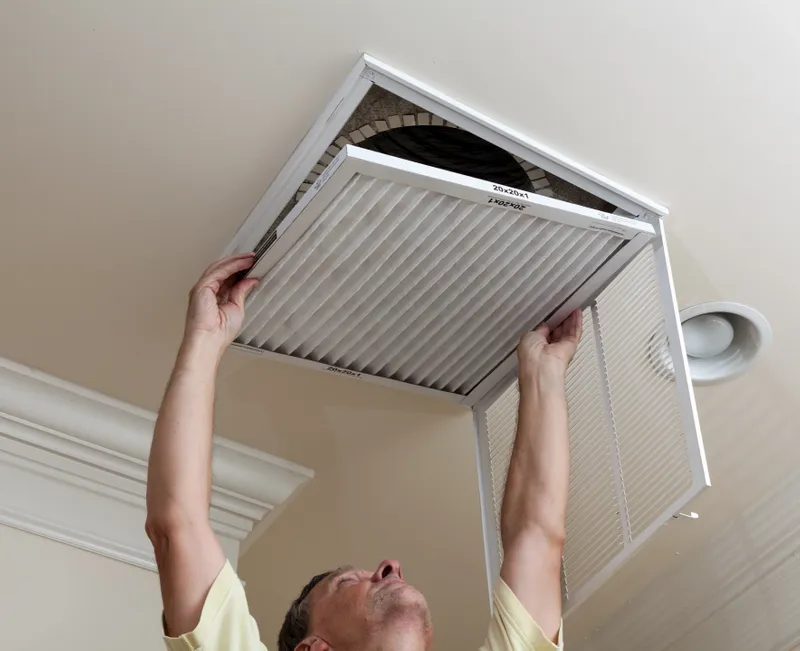 Technician providing HVAC service